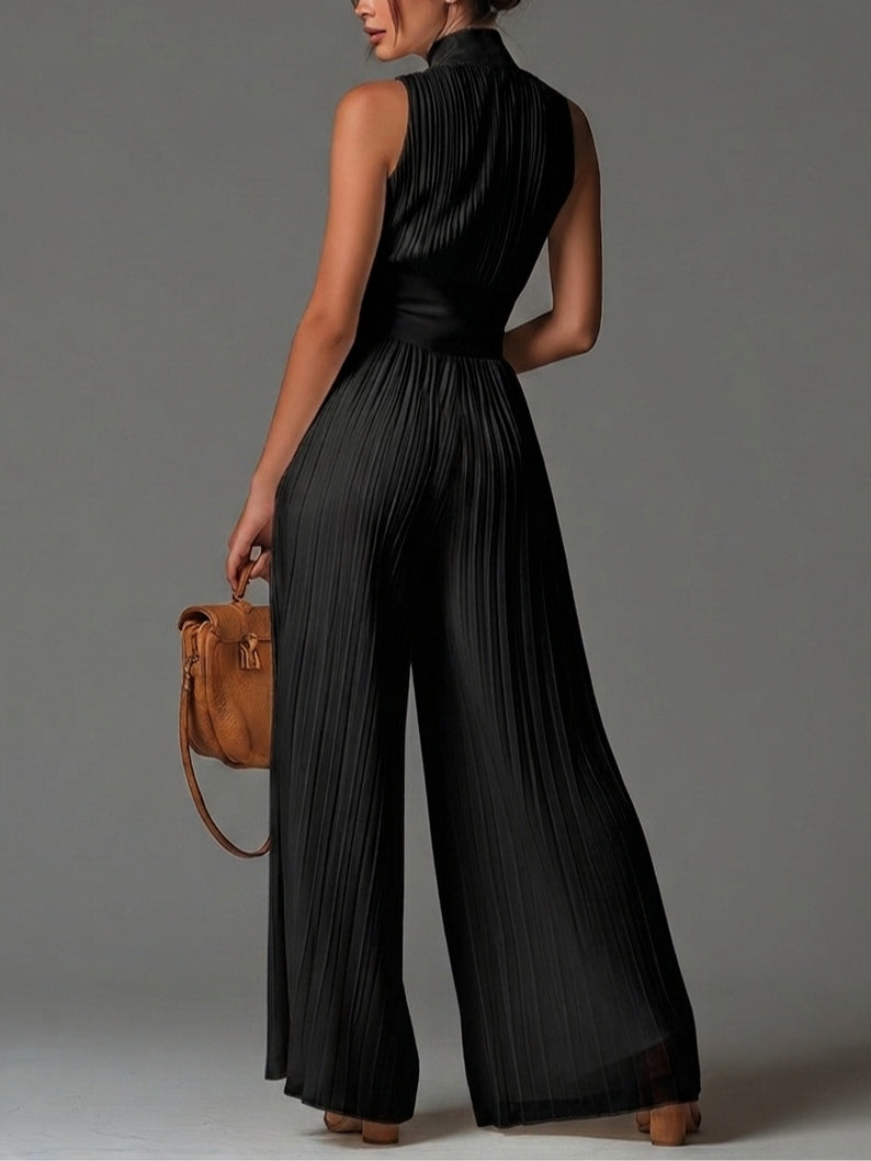 Valentina | Mono negro plisado con un encanto sofisticado